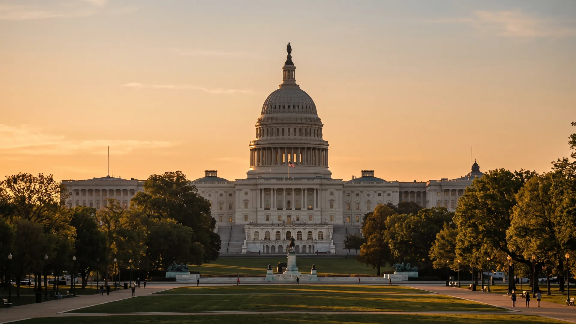 The U.S. Capitol dome at golden hour, seen across the National Mall